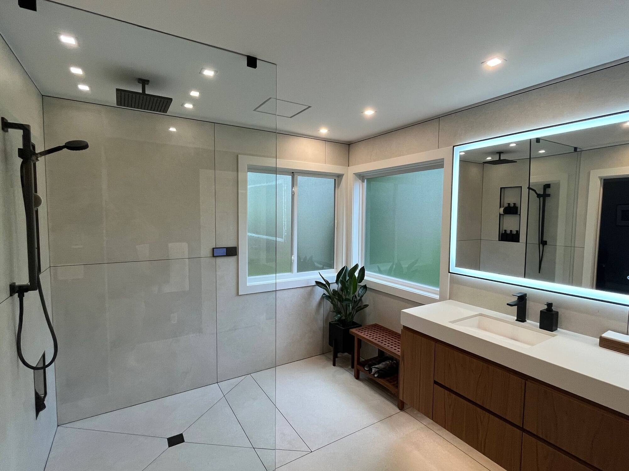 Swank Builders Inc bathroom remodel barrier free walk in shower with tile surround in Burton MI