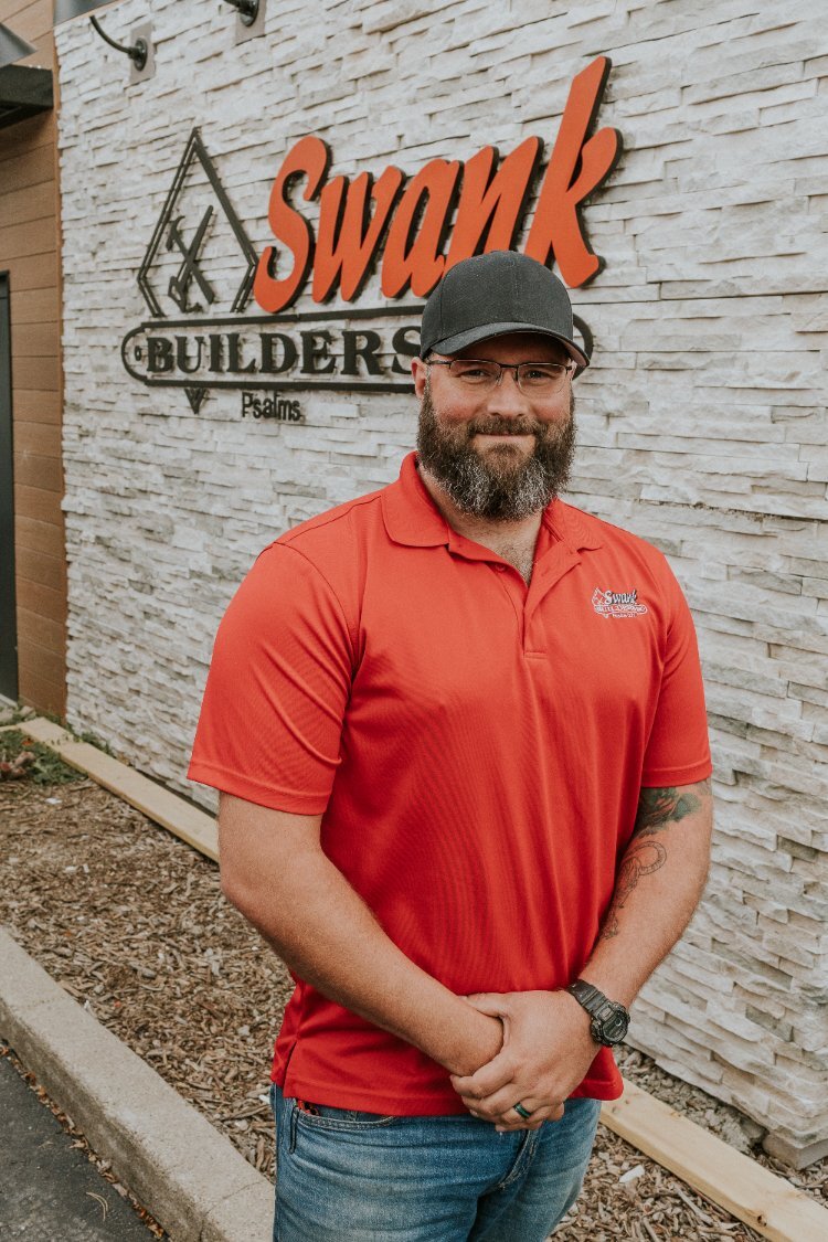 Jeremy Pate of Swank Builders Inc standing outside the custom home builder office in Flint, MI.-optimized