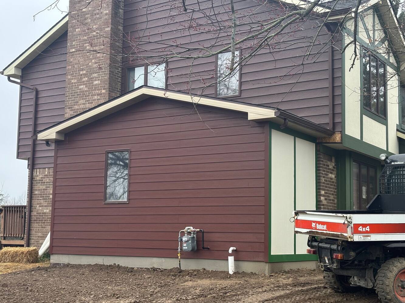 Swank Builders Inc additions project finished bedroom addition exterior with new siding in Fenton MI