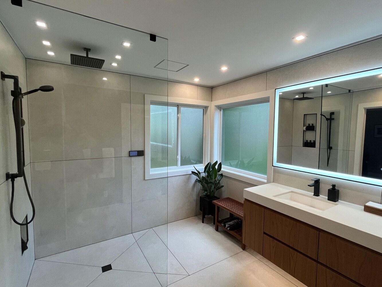 bathroom remodel with a walk-in shower