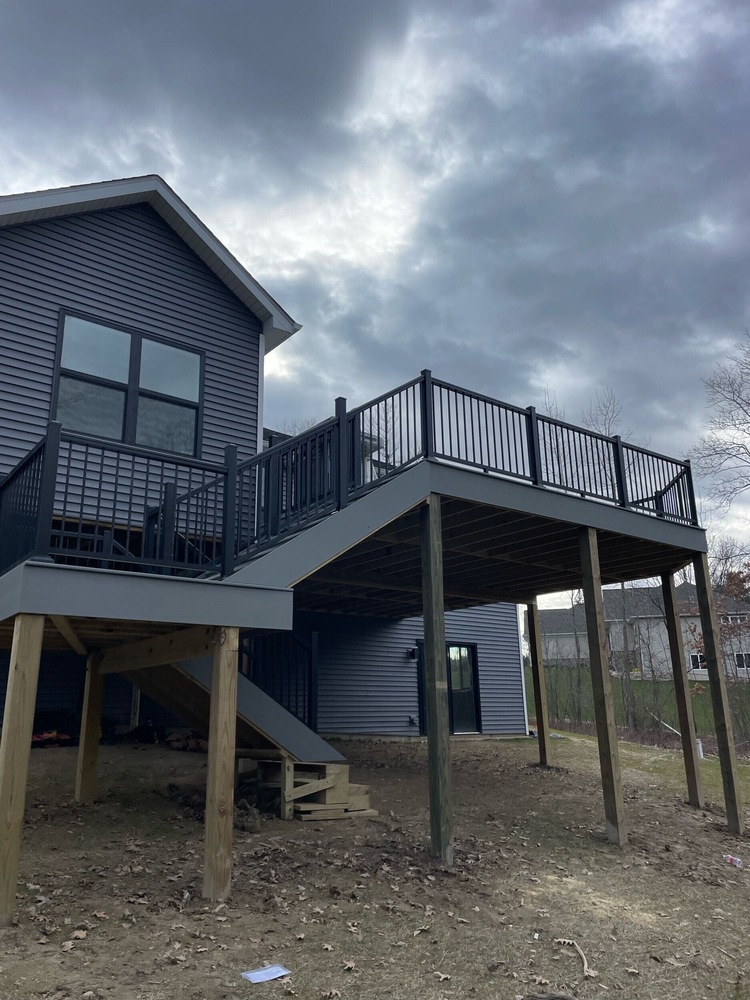 Swank Builders Inc custom elevated deck system with durable framing and composite decking in Michigan