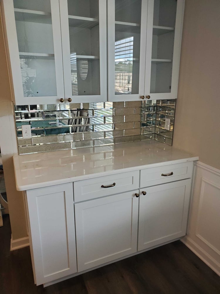 Swank Builders Inc custom built-in cabinetry and storage solution in Burton MI