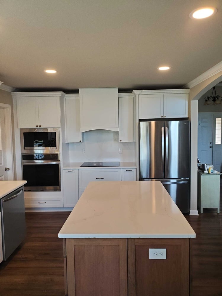 Swank Builders Inc modern kitchen appliance wall with custom cabinets in Burton MI